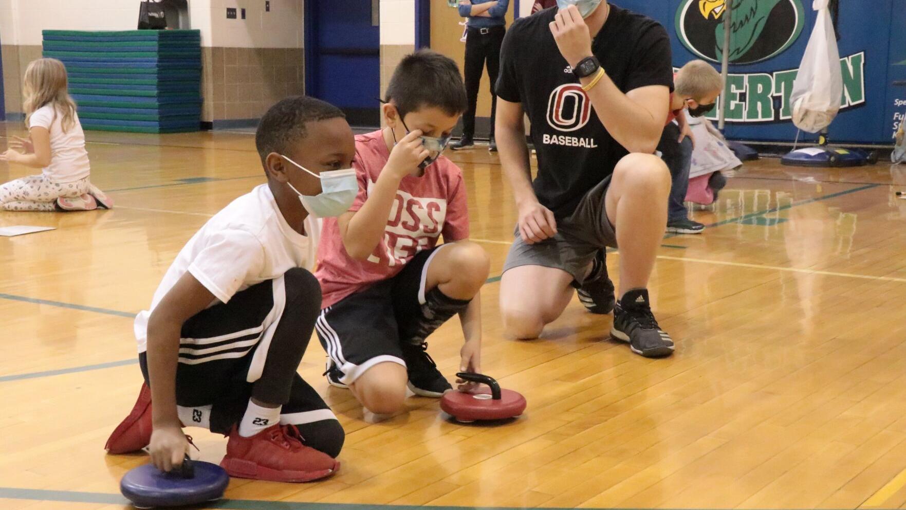Fullerton Elementary students introduced to curling before attending Olympic Trials